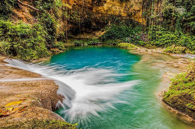 Action Pack Combo: Blue hole, river tubing and Dunn's River Falls - Guides, safety, and the drive through Jamaica’s real everyday scenes