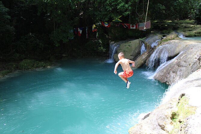 Blue Hole and River Tubing From Ocho Rios Includes Entry Fees - Blue Hole: Rope Swing Fun with Lifeguards Watching the Play