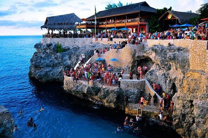 Catamaran Cruise Full Day Tour to Reef, Caves and Negril Beach - The catamaran cruise: open bar reggae and a proper sea-deck day