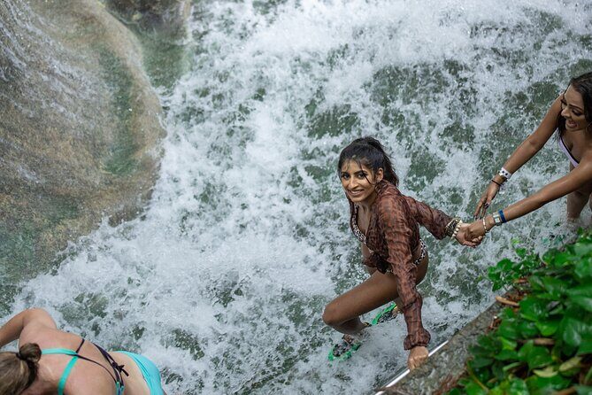 Catamaran Cruise with Snorkeling and Dunn's River Falls - Lunch, Coffee Tasting, and the Rum Punch Party Return Sail