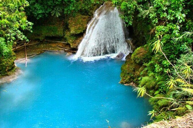 "Explore Scenic Tropical Waterfalls at Blue Hole" - The guide effect: Peat Taylor Tours and help that goes beyond the moment