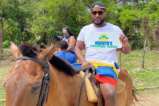 Horseback Riding in the ocean & Bamboo Rafting from Ocho Rios - White River bamboo rafting: rapids, lagoons, and wildlife spotting