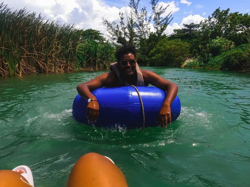 Ocho Rios: Irie Blue Hole and River Tubing Tour - Blue Hole at Island Gully Falls: rope swings, waterfall swimming, and cave spots